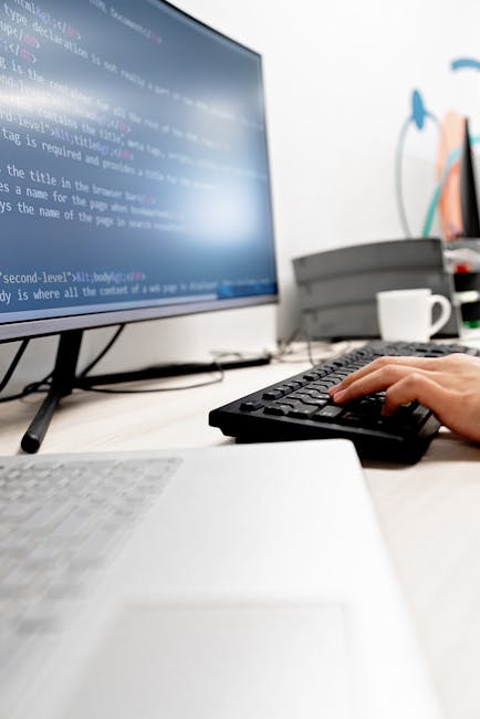 A computer screen displaying a file editing environment with a dark background, showing the HTML code of an web page. The code includes tags such as <html>, <head>, <title>, and <link>, with visible a